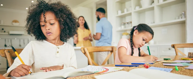 Kids doing their homeschooling homework.